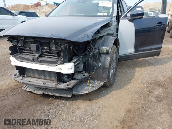 2023 Mazda CX-9 Touring with VIN JM3TCBCY6P0642838, listed as a IAAI auction lot 42407123 with 15,181 mi miles and . Bid and sale history available at DreamBid. Image 17.