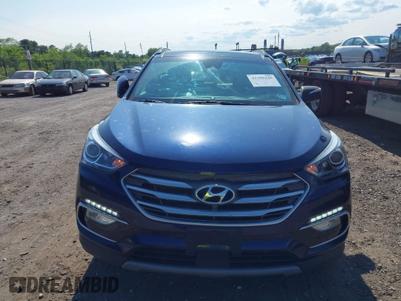 2018 Hyundai Santa Fe Ultimate with VIN 5XYZWDLA3JG571432, listed as a IAAI auction lot 42395245 with 69,330 mi miles and . Bid and sale history available at DreamBid. Image 12.