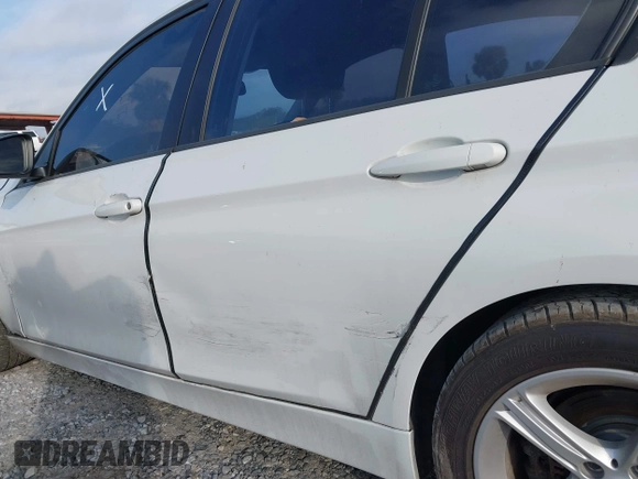 2014 BMW 3 Series 320i with VIN WBA3B1G59ENS78532, listed as a IAAI auction lot 41627172 with 133,049 mi miles. Bid and sale history available at carsss.com. Image 15.