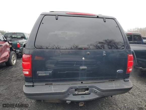 2000 Ford Expedition XLT with VIN 1FMPU16L4YLB83421, listed as a Copart auction lot 51792805 with 128,553 mi miles and Salvage Title. Bid and sale history available at carsss.com. Image 6.