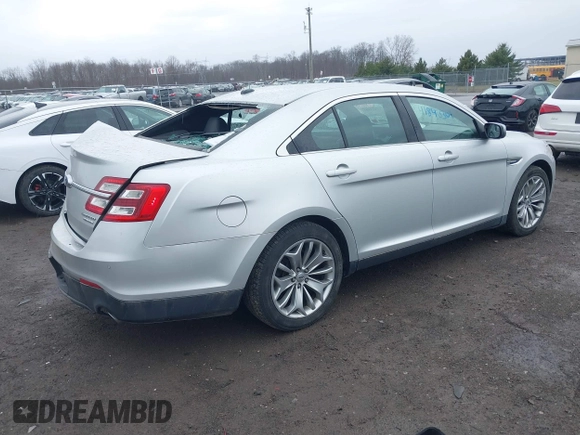 2014 Ford Taurus Limited with VIN 1FAHP2F81EG123933, listed as a IAAI auction lot 41843301 with 111,629 mi miles. Bid and sale history available at carsss.com. Image 4.