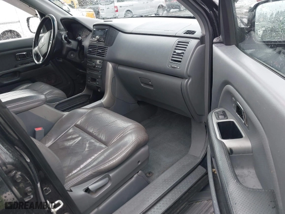 2004 Honda Pilot EX with VIN 2HKYF18674H585328, listed as a IAAI auction lot 41688735 with 214,194 mi miles. Bid and sale history available at carsss.com. Image 5.