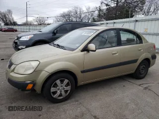 2009 Kia Rio SX with VIN KNADE223796524159, listed as a Copart auction lot 86185964 with 157,061 mi miles and Salvage Title. Bid and sale history available at carsss.com. Image 1.
