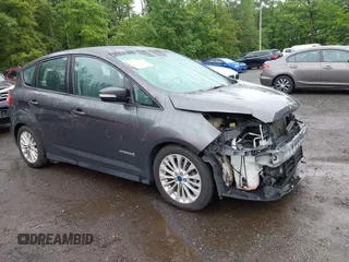 2018 Ford C-Max SE z VIN 1FADP5AU4JL100846, wystawiony jako IAAI lot #42307229 z przebiegiem 66 076 mil mil oraz . Historia ofert i sprzedaży dostępna na DreamBid. Obrazek 1.