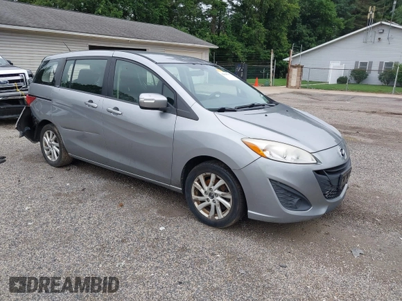 2014 Mazda 5 Sport z VIN JM1CW2BL5E0172594, wystawiony jako IAAI lot #42628707 z przebiegiem 180 369 mil mil oraz . Historia ofert i sprzedaży dostępna na DreamBid. Obrazek 1.
