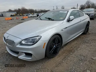 2012 BMW 6 Series 650i z VIN WBALX3C57CC528555, wystawiony jako Copart lot #81548564 z przebiegiem Nie podano mil oraz Szkoda całkowita • Salvage title. Historia ofert i sprzedaży dostępna na DreamBid. Obrazek 1.