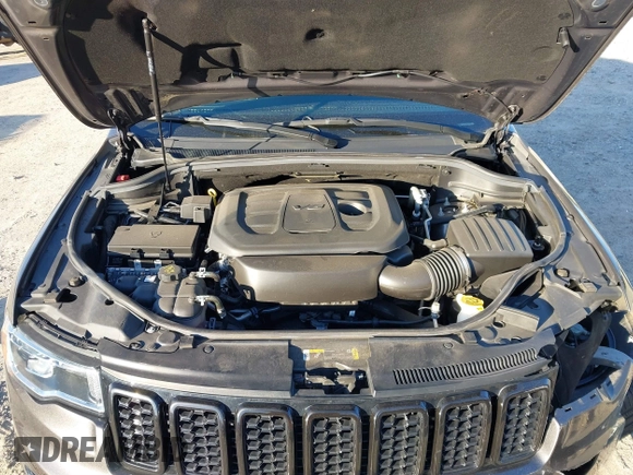 2021 Jeep Grand Cherokee 80th Anniversary z VIN 1C4RJFBG5MC737412, wystawiony jako IAAI lot #41753550 z przebiegiem 54 921 mil mil oraz . Historia ofert i sprzedaży dostępna na DreamBid. Obrazek 10.