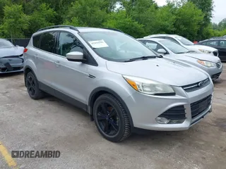 2014 Ford Escape SE z VIN 1FMCU0GX1EUA52754, wystawiony jako IAAI lot #42444395 z przebiegiem 82 250 mil mil oraz . Historia ofert i sprzedaży dostępna na DreamBid. Obrazek 1.
