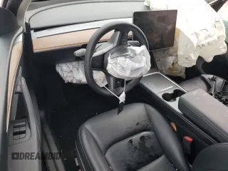 2024 Tesla Model Y с VIN 7SAYGDED1RF092027, выставлен на аукционе Copart как лот 51655485 с пробегом 22 010 миль миль и Списание • Salvage title. История ставок и продаж доступна на DreamBid. Изображение 8.