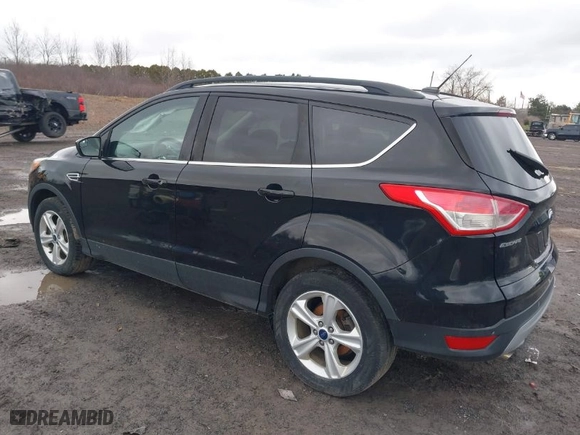 2016 Ford Escape SE with VIN 1FMCU9G97GUB49000, listed as a IAAI auction lot 41797005 with 104,690 mi miles. Bid and sale history available at carsss.com. Image 3.