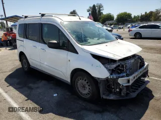 2015 Ford Transit Connect XLT with VIN NM0AE8F78F1185830, listed as a Copart auction lot 70062174 with 72,658 mi miles and Salvage title. Bid and sale history available at DreamBid. Image 4.