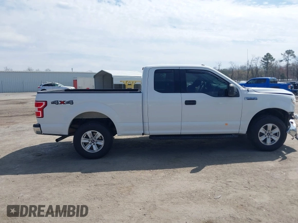 2018 Ford F-150 XL with VIN 1FTEX1EB4JFA77373, listed as a IAAI auction lot 41813197 with 235,251 mi miles and . Bid and sale history available at DreamBid. Image 14.