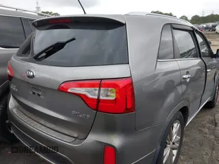 2015 Kia Sorento SX with VIN 5XYKW4A74FG603479, listed as a IAAI auction lot 41515797 with 151,496 mi miles. Bid and sale history available at carsss.com. Image 4.