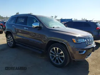 2017 Jeep Grand Cherokee Overland z VIN 1C4RJECG0HC960178, wystawiony jako IAAI lot #42315844 z przebiegiem 63 271 mil mil oraz . Historia ofert i sprzedaży dostępna na DreamBid. Obrazek 1.