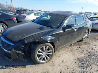 2015 Infiniti Q70 with VIN JN1BY1AR6FM560209, listed as a IAAI auction lot 41703926 with 117,503 mi miles and . Bid and sale history available at DreamBid. Image 2.
