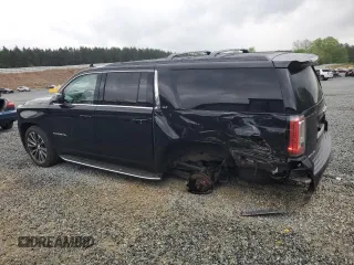 2017 GMC Yukon XL SLT with VIN 1GKS1GKC5HR332484, listed as a Copart auction lot 51957095 with 188,204 mi miles and Salvage Title. Bid and sale history available at DreamBid. Image 2.