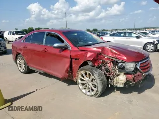 2014 Ford Taurus Limited with VIN 1FAHP2F89EG186567, listed as a Copart auction lot 61404285 with 188,890 mi miles and Salvage title. Bid and sale history available at DreamBid. Image 4.