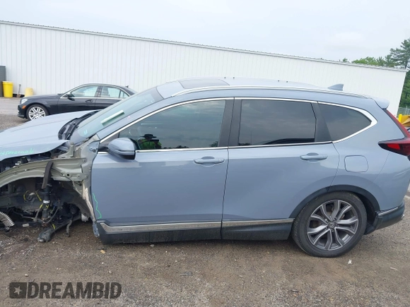 2021 Honda CR-V Touring with VIN 7FART6H91ME022993, listed as a IAAI auction lot 42439344 with 30,477 mi miles and . Bid and sale history available at DreamBid. Image 15.