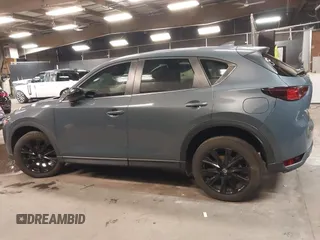 2021 Mazda CX-5 Touring with VIN JM3KFBCM5M0394707, listed as a IAAI auction lot 41887973 with 44,670 mi miles. Bid and sale history available at carsss.com. Image 15.