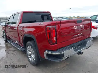 2021 GMC Sierra 1500 SLT z VIN 3GTU9DED2MG153183, wystawiony jako IAAI lot #41880942 z przebiegiem 84 686 mil mil oraz . Historia ofert i sprzedaży dostępna na DreamBid. Obrazek 3.