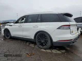 2020 Lincoln Aviator Reserve z VIN 5LM5J7XC6LGL29401, wystawiony jako Copart lot #59980655 z przebiegiem Nie podano mil oraz Szkoda całkowita • Salvage title. Historia ofert i sprzedaży dostępna na DreamBid. Obrazek 2.
