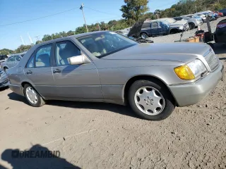 1994 Mercedes-Benz S 320 with VIN WDBGA32EXRA183306, listed as a Copart auction lot 76514554 with 158,814 mi miles and Clean Title. Bid and sale history available at DreamBid. Image 4.