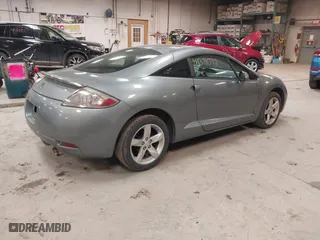 2008 Mitsubishi Eclipse GS with VIN 4A3AK24FX8E007154, listed as a IAAI auction lot 41371072 with 134,549 mi miles. Bid and sale history available at carsss.com. Image 4.