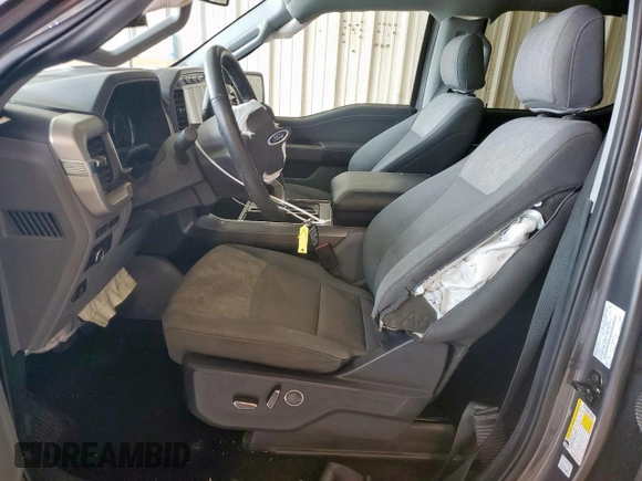 2021 Ford F-150 XL with VIN 1FTEW1CP1MFC04764, listed as a Copart auction lot 59572975 with 61,576 mi miles and Salvage title. Bid and sale history available at DreamBid. Image 7.