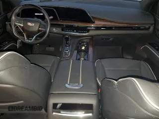 2023 Cadillac Escalade z VIN 1GYS3KKL3PR360009, wystawiony jako Copart lot #77258524 z przebiegiem 12 874 mil mil oraz Szkoda całkowita • Salvage title. Historia ofert i sprzedaży dostępna na DreamBid. Obrazek 8.