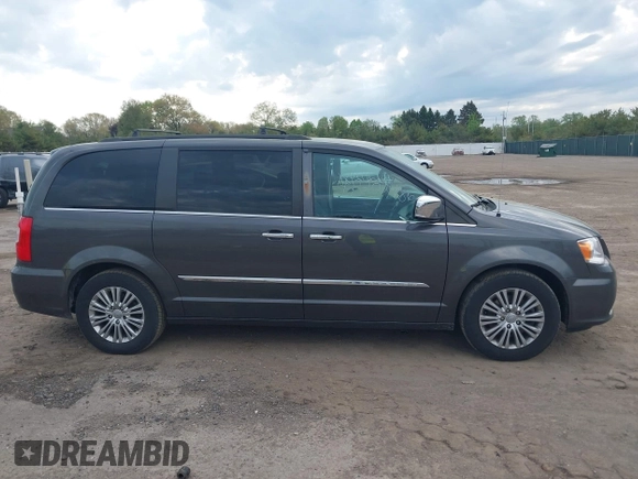 2015 Chrysler Town & Country Touring L with VIN 2C4RC1CG9FR646214, listed as a IAAI auction lot 42202486 with 184,555 mi miles and . Bid and sale history available at carsss.com. Image 13.