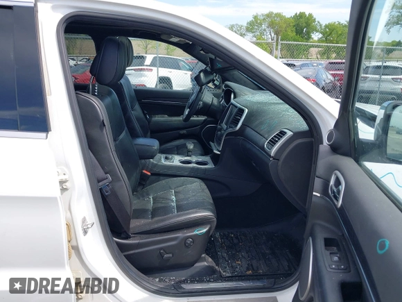 2014 Jeep Grand Cherokee Summit with VIN 1C4RJFJG0EC174871, listed as a IAAI auction lot 42341312 with 170,743 mi miles and . Bid and sale history available at DreamBid. Image 5.