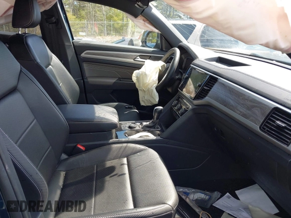 2022 Volkswagen Atlas SE z VIN 1V2HE2CA4NC220203, wystawiony jako IAAI lot #41982896 z przebiegiem 61 989 mil mil oraz . Historia ofert i sprzedaży dostępna na DreamBid. Obrazek 5.