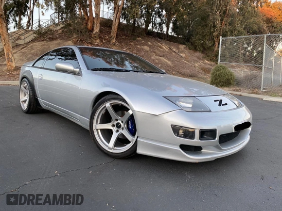 1990 Nissan 300ZX z VIN JN1RZ24A6LX013894, wystawiony jako Copart lot #59821625 z przebiegiem 107 310 mil mil oraz Szkoda całkowita • Salvage title. Historia ofert i sprzedaży dostępna na DreamBid. Obrazek 1.