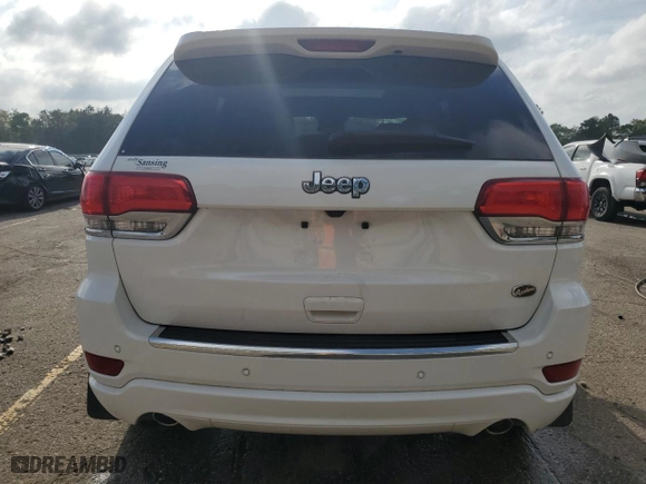 2019 Jeep Grand Cherokee Overland with VIN 1C4RJECG4KC833019, listed as a Copart auction lot 51277555 with 124,072 mi miles and Salvage Title. Bid and sale history available at carsss.com. Image 6.