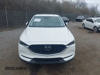 2020 Mazda CX-5 Grand Touring with VIN JM3KFBDM5L0731373, listed as a IAAI auction lot 41900567 with 31,268 mi miles and . Bid and sale history available at DreamBid. Image 12.