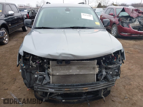 2019 Dodge Journey SE with VIN 3C4PDCBG9KT869149, listed as a IAAI auction lot 41472289 with 97,333 mi miles and . Bid and sale history available at DreamBid. Image 13.