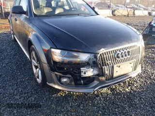 2014 Audi allroad Premium Plus with VIN WA1UFAFL1EA156213, listed as a IAAI auction lot 41610274 with 115,688 mi miles. Bid and sale history available at carsss.com. Image 6.