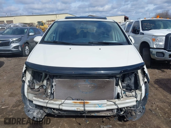 2014 Honda Odyssey EX-L with VIN 5FNRL5H63EB136541, listed as a IAAI auction lot 41866320 with 148,696 mi miles and . Bid and sale history available at DreamBid. Image 13.