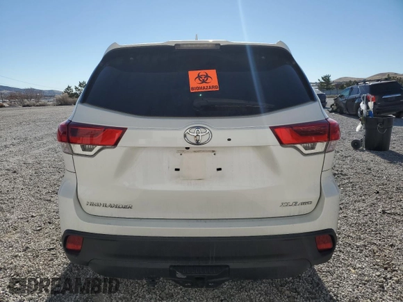 2019 Toyota Highlander SE z VIN 5TDJZRFH5KS570491, wystawiony jako Copart lot #50373435 z przebiegiem Nie podano mil oraz Szkoda całkowita • Salvage title. Historia ofert i sprzedaży dostępna na DreamBid. Obrazek 6.