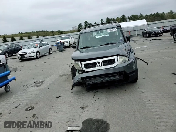 2011 Honda Element EX z VIN 5J6YH2H75BL002265, wystawiony jako Copart lot #56382765 z przebiegiem Nie podano mil oraz Szkoda całkowita • Salvage title. Historia ofert i sprzedaży dostępna na DreamBid. Obrazek 14.
