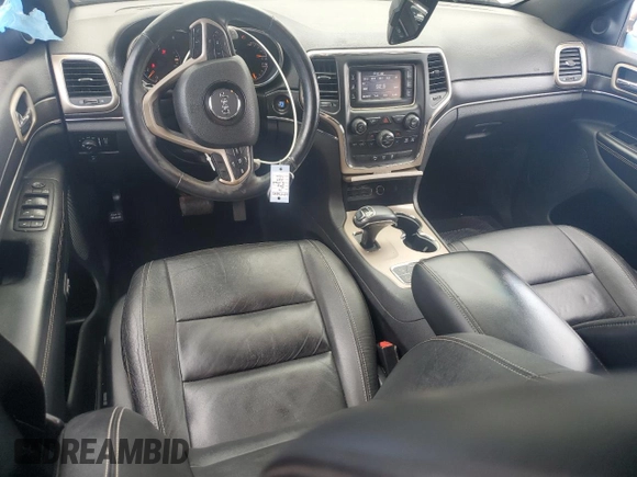 2014 Jeep Grand Cherokee Limited z VIN 1C4RJFBG7EC204799, wystawiony jako Copart lot #62458805 z przebiegiem 126 966 mil mil oraz Szkoda całkowita • Salvage title. Historia ofert i sprzedaży dostępna na DreamBid. Obrazek 8.