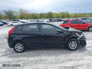 2014 Hyundai Accent GS with VIN KMHCT5AE7EU164658, listed as a IAAI auction lot 41911092 with 132,442 mi miles. Bid and sale history available at carsss.com. Image 13.