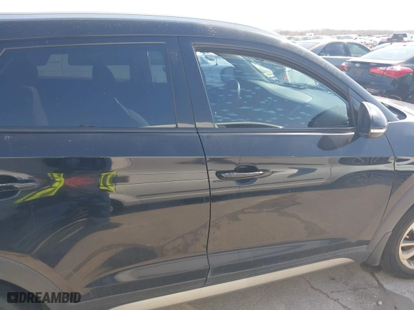 2017 Hyundai Tucson Value with VIN KM8J33A28HU302472, listed as a IAAI auction lot 41717598 with 126,438 mi miles. Bid and sale history available at carsss.com. Image 13.