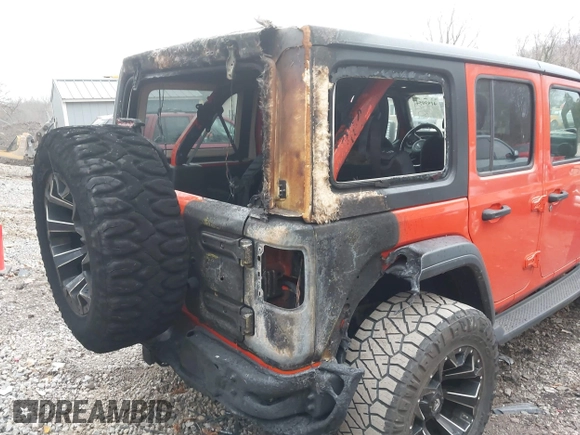 2018 Jeep Wrangler Unlimited Sport z VIN 1C4HJXDN4JW198045, wystawiony jako IAAI lot #41930547 z przebiegiem 62 402 mil mil oraz . Historia ofert i sprzedaży dostępna na DreamBid. Obrazek 6.