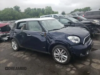 2014 MINI Countryman S с VIN WMWZC5C5XEWP36643, выставлен на аукционе Copart как лот 60142695 с пробегом 116 497 миль миль и Списание • Salvage title. История ставок и продаж доступна на DreamBid. Изображение 4.