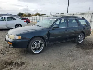 1995 Toyota Camry LE z VIN 4T1GK12W4SU079938, wystawiony jako Copart lot #77065084 z przebiegiem 222 731 mil mil oraz Szkoda całkowita • Salvage title. Historia ofert i sprzedaży dostępna na DreamBid. Obrazek 1.