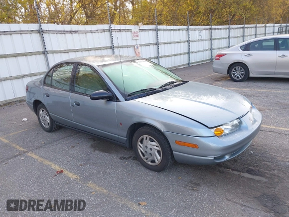 2002 Saturn SL z VIN 1G8ZS528327278417, wystawiony jako IAAI lot #40611406 z przebiegiem 227 283 mil mil oraz . Historia ofert i sprzedaży dostępna na DreamBid. Obrazek 1.