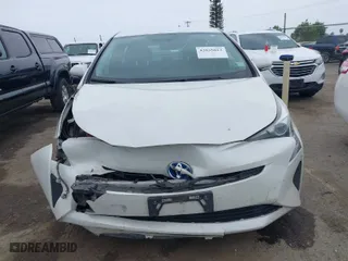 2016 Toyota Prius Two with VIN JTDKBRFU2G3503863, listed as a IAAI auction lot 42035013 with 118,930 mi miles. Bid and sale history available at carsss.com. Image 13.