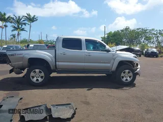 2014 Toyota Tacoma with VIN 3TMLU4EN3EM159080, listed as a IAAI auction lot 41809259 with 113,950 mi miles and . Bid and sale history available at DreamBid. Image 13.