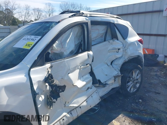 2013 Mazda CX-5 Grand Touring with VIN JM3KE2DE2D0122805, listed as a IAAI auction lot 41201502 with 178,833 mi miles. Bid and sale history available at carsss.com. Image 6.